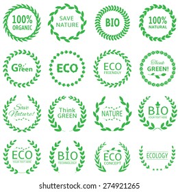 Eco and bio concept logo set. Natural and organic emblems with green laurels.