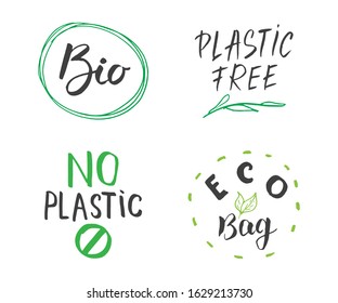 Eco and Bio Hand Drawn labels Set. Calligraphic Letterings with eco friendly sketch doodle elements. Vector illustration.