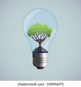 Eco bulb with a green tree inside the glass