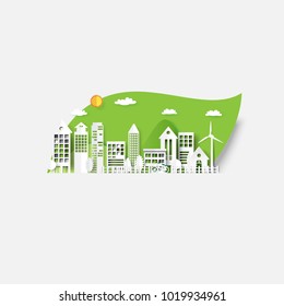 Eco city on green leaf background.Paper art of renewable energy ecology and environment conservation creative idea concept design.Vector illustration.