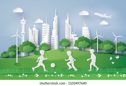 eco concept and environment with boy playing football in the city park , Paper art and digital craft style.