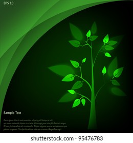 Eco concept: green tree with bright leaves under dark background