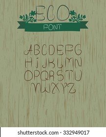 eco font on wooden background