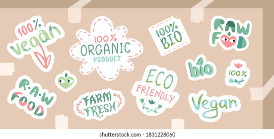 Eco food delivery. Collection of stickers designed to natural products and vegan lifestyle pasted on a cardboard box with pieces of scotch tape. Organic product,raw food,eco friendly,vegan,farm fresh.