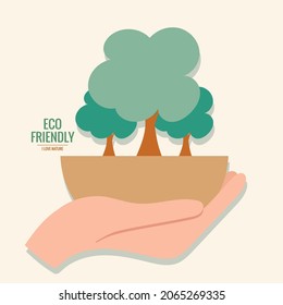 ECO FRIENDLY. Ecology concept with hand holding tree. Vector illustration