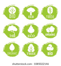 Eco friendly, organic, tree logos on green grunge background. Vector nature ecology symbol of set illustration