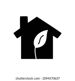 Icono de la casa ecológica en glifo plano negro, estilo relleno aislado en fondo blanco