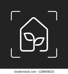 eco house icon concept. White object in camera autofocus on dark background