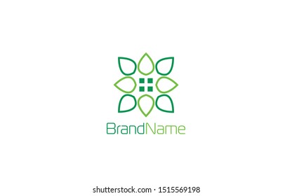 Eco house logo formed with leaf and window symbols in green background