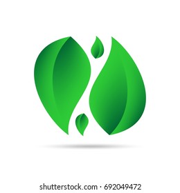 Eco icon from green leaves side by side on a white background with gray shadow on the bottom. Abstract design natural 
