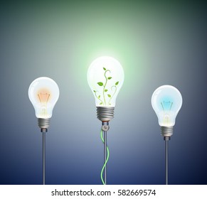 Eco light bulb concept, group of bulbs and one is green, realistic light bulb with plant inside and two simple bulbs red and blue, ecology energy concept