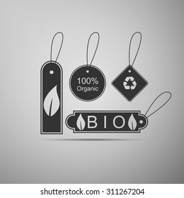 Eco organic labels icon on grey background. Vector Illustration