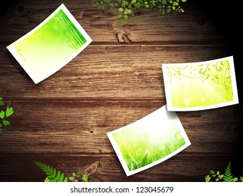 Eco Theme with Some Nature Photos at Natural Dark Wooden Background