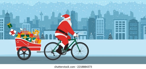 Eco-friendly Santa Claus delivering Christmas gifts, he is riding a bicycle with a trailer in the city street