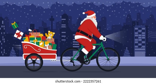 Eco-friendly Santa Claus delivering Christmas gifts, he is riding a bicycle with a trailer in the city street