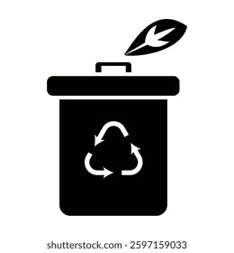 Eco-Friendly Trash Can Silhouette Icon with Leaf  Sustainable Waste Disposal Symbol