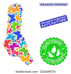 Ecological composition of bright mosaic map of Grande Comore Island and textured seals with Nature Reserve caption. Mosaic map of Grande Comore Island constructed with colorful butterflies.