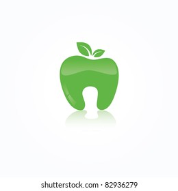 Ecological symbol of human tooth as a green apple with leaf