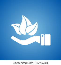 Ecology, Leaf in hand Icon on blue color.