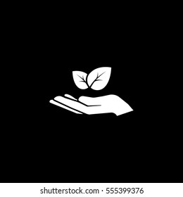 Ecology Leaf On Hand Flat Icon On Black Background