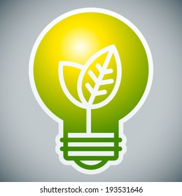 Bombilla de luz ecológica sobre fondo gris
