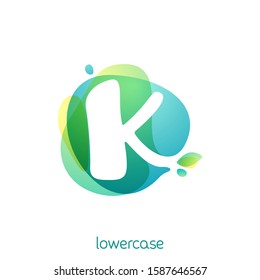 Ecology lowercase letter k logo. Overlapping watercolor font with green leaves. Vector green template can be used for vegan, bio, raw, organic.