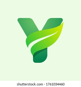 Ecology Y letter logo with green leaf. Vector typeface for agriculture labels, vegan headlines, herbal posters, summer identity etc.