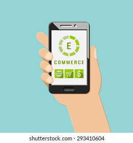 E-commerce concept with mobile apps and icons. Hand holding smartphone.