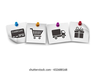 E-commerce symbols on white paper with colorful push pin