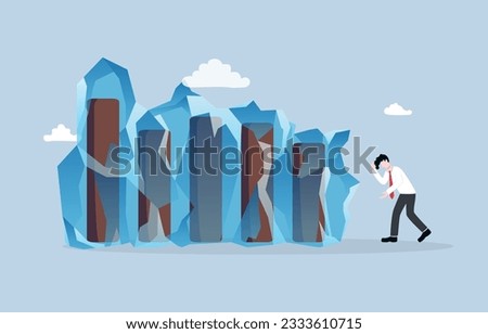 Economic slowdown or stagnation, declining consumer spending, paralysis of economic activity concept, Frustrated businessman with bar graph stuck in ice.