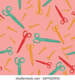 ector seamless pattern with scissors. Orange background.