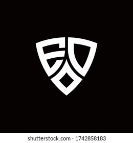 ED monogram logo with modern shield style design template isolated on black background
