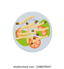 Edible caterpillar on plate. Asian dish with insects, vegetables and tomatoes with salad. White larva in restaurant with sauce