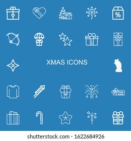 Editable 22 xmas icons for web and mobile. Set of xmas included icons line Gift, Gift box, Christmas tree, Fireworks, Offer, Bow, Stars, Star, Sweater, Present on blue background