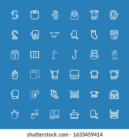Editable 36 hanging icons for web and mobile. Set of hanging included icons line Crib, Gloves, Towel, Boxing gloves, Sloth, Baby bed, Socks, Hook, Tissue, Container on blue background