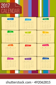 Editable funny 2017 calendar on color striped background.