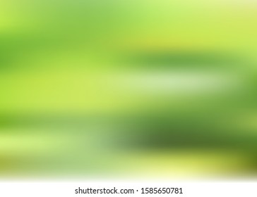 Editable Green blurred gradient background backdrop with sunlight Vector made with a gradient mesh