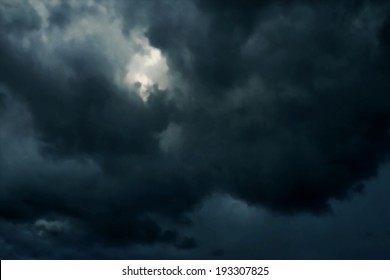 Editable vector illustration of dark heavy rainclouds made with a gradient mesh