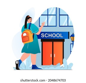 Education concept in modern flat design. Teenager pupil goes to school. Student stands in front of entrance to school building. Young girl learning at college or university. Vector illustration