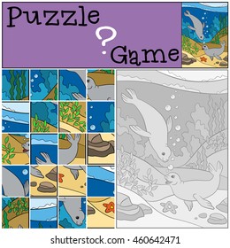 Education game: Puzzle. Two little cute seals swim underwater and smiles.