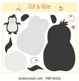 Education paper game for the development of preschool children. Cut parts of the image and glue on the paper. Vector illustration. Use scissors and glue to create the applique. penguin