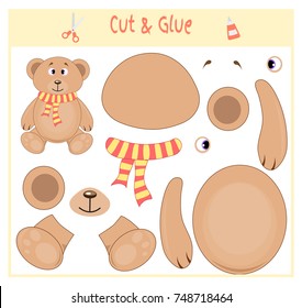 Education paper game for the development of preschool children. Cut parts of the image and glue on the paper. Vector illustration. Use scissors and glue to create the applique. Bear in scarf. Teddy