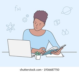 Education, study, learning concept. Girl studying in bed withlaptop and books. Student workplace desktop computer doing homework