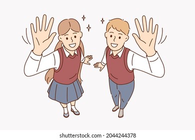 Education, studying and knowledge concept. Smiling boy and girl students pupils standing waving hands looking at camera showing excitement vector illustration 