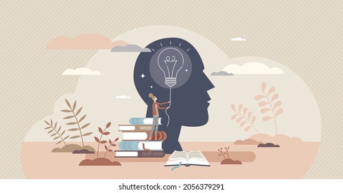 電球と頭を持つ教育心理学の小さな人間のコンセプト。知性の発達のための技術を教える。人間の好奇心、想像力、発見のプロセスを学習によって促進する。
