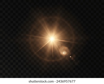 The effect of bright sunlight. Twinkling gold star on a transparent background.Bright light effect.	