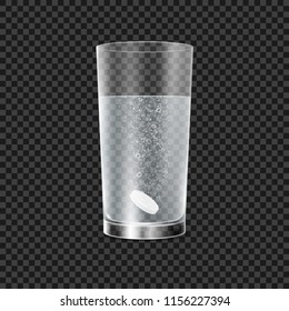 Effervescent tablet pill falling in a glass with water fizzy bubbles isolated. Medicine aspirin headache painkiller.