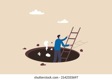 Effort and brave to solve business problem, get out of crisis or escape from trouble situation, reaching goal or solution concept, businessman survivor climb up ladder out of the hole or deep crater.