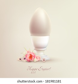 Egg in egg cup for Easter. Pastel colors. Flowers. Wishing a happy Easter.