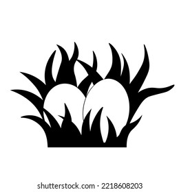 Egg in the grass vector stock illustration. Black silhouettes of chicken eggs. Nest. Vector stock illustration. Isolated on a white background.